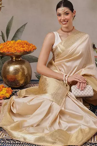 Beige plain silk blend ethnic saree with blouse piece