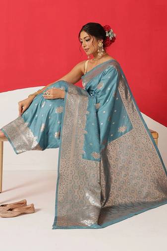 Teal woven art silk traditional saree with blouse piece