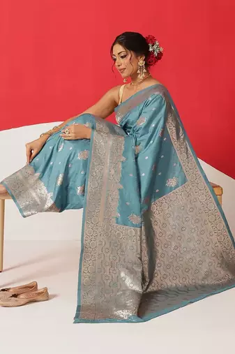 Teal woven art silk traditional saree with blouse piece