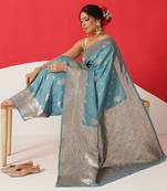 Teal woven art silk traditional saree with blouse piece