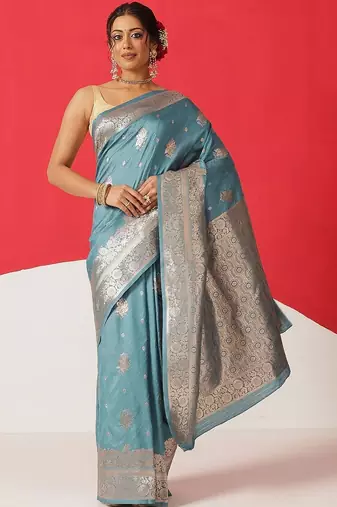 Teal woven art silk traditional saree with blouse piece
