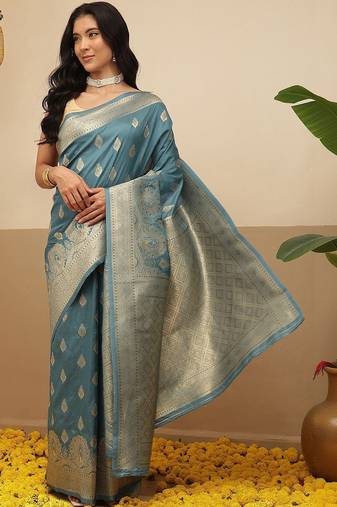 Teal woven art silk traditional saree with blouse piece