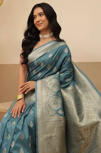 Teal woven art silk traditional saree with blouse piece