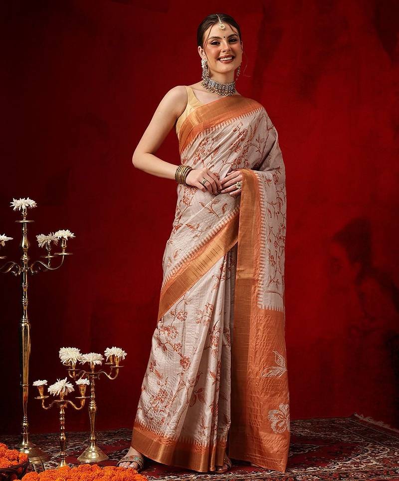 Cream printed art silk ethnic saree with blouse piece