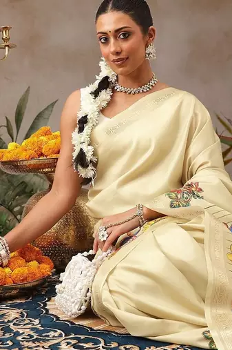 Cream printed art silk ethnic saree with blouse piece