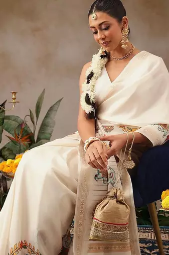 Off white printed art silk ethnic saree with blouse piece