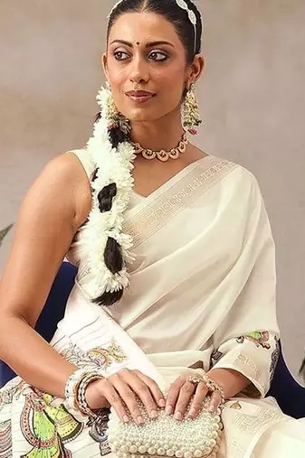 Off white printed art silk ethnic saree with blouse piece