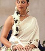Off white printed art silk ethnic saree with blouse piece