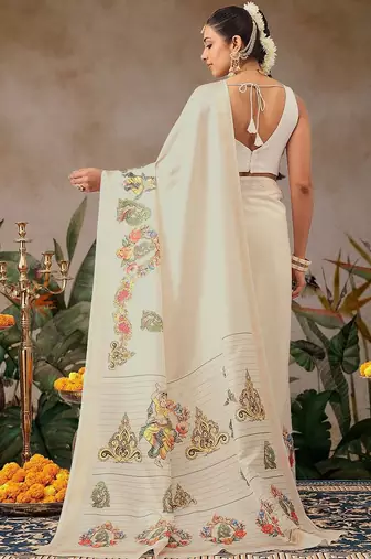 Off white printed art silk ethnic saree with blouse piece