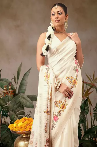 Off white printed art silk ethnic saree with blouse piece