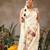 Off white printed art silk ethnic saree with blouse piece