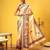Beige printed silk blend ethnic saree with blouse piece