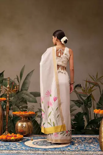 Off white printed silk blend ethnic saree with blouse piece