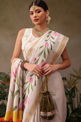 Off white printed silk blend ethnic saree with blouse piece