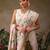 Off white printed silk blend ethnic saree with blouse piece