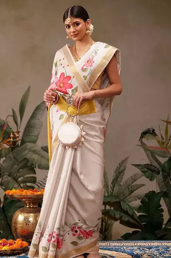 Off white printed silk blend ethnic saree with blouse piece