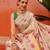 Cream printed silk blend ethnic saree with blouse piece