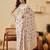 Cream printed silk blend ethnic saree with blouse piece