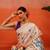 Cream printed silk blend ethnic saree with blouse piece