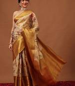 Cream printed art silk ethnic saree with blouse piece