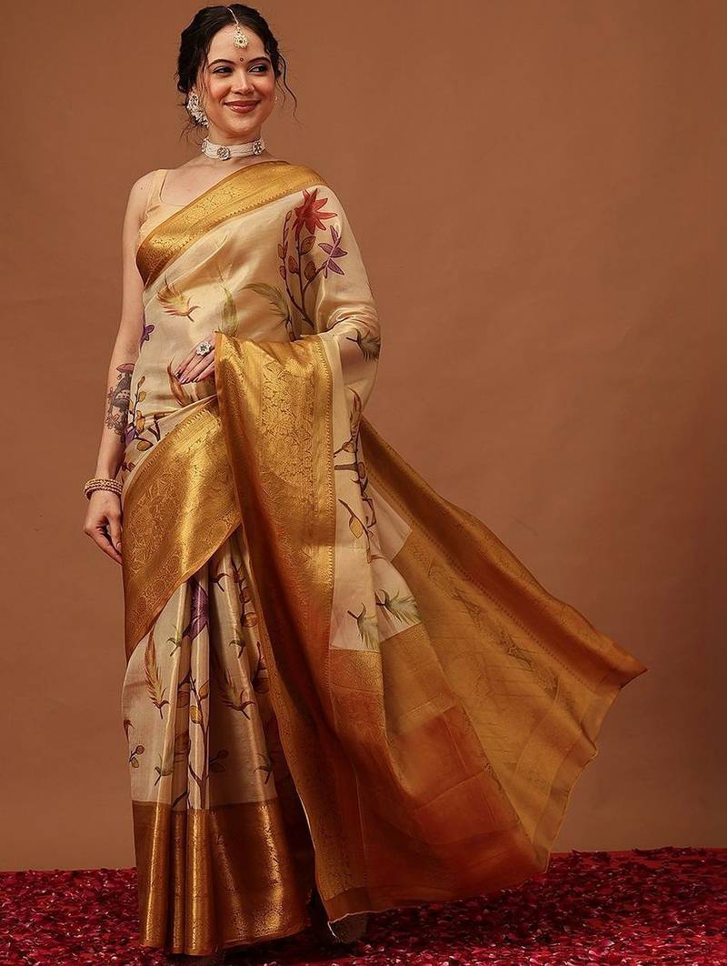 Cream printed art silk ethnic saree with blouse piece