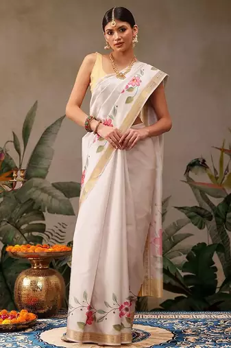 Off white printed silk blend ethnic saree with blouse piece