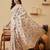Cream printed silk blend ethnic saree with blouse piece