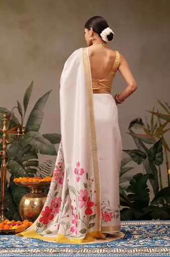 Off white printed silk blend ethnic saree with blouse piece