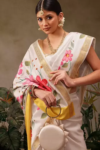 Off white printed silk blend ethnic saree with blouse piece