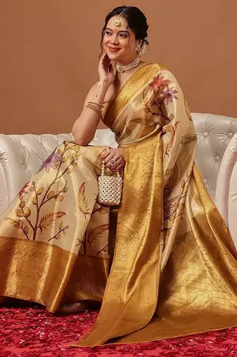 Cream printed art silk ethnic saree with blouse piece
