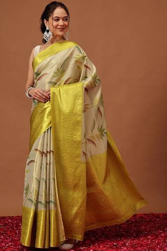 Cream printed art silk ethnic saree with blouse piece