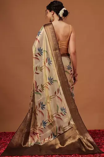 Cream printed art silk ethnic saree with blouse piece