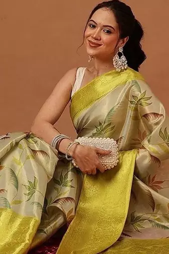 Cream printed art silk ethnic saree with blouse piece