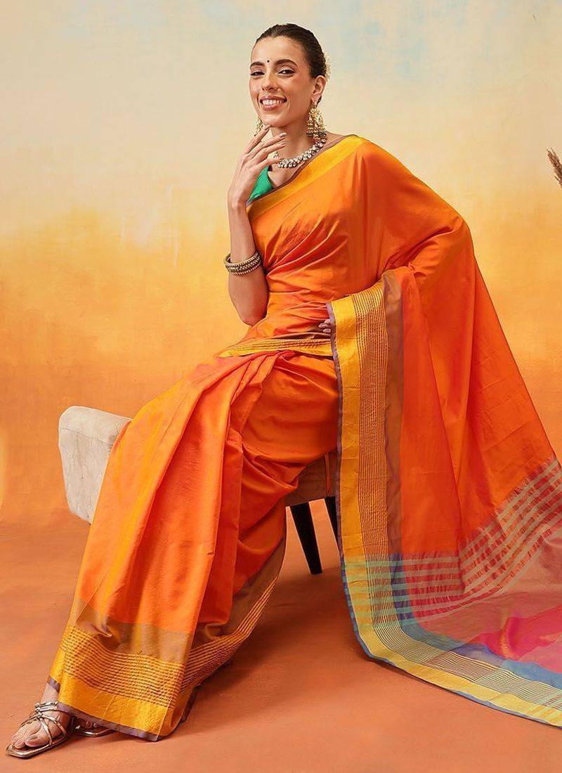 Orange plain art silk traditional saree with blouse piece