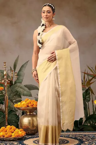 Off white woven silk blend ethnic saree with blouse piece