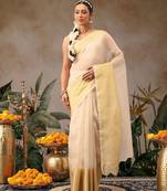 Off white woven silk blend ethnic saree with blouse piece