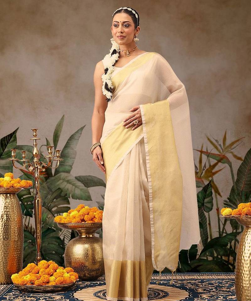 Off white woven silk blend ethnic saree with blouse piece