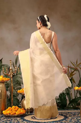Off white woven silk blend ethnic saree with blouse piece