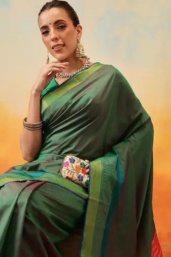 Green plain art silk traditional saree with blouse piece