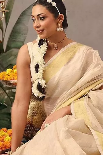 Off white woven silk blend ethnic saree with blouse piece