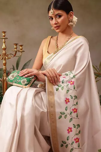 White printed silk blend ethnic saree with blouse piece