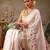 White printed silk blend ethnic saree with blouse piece
