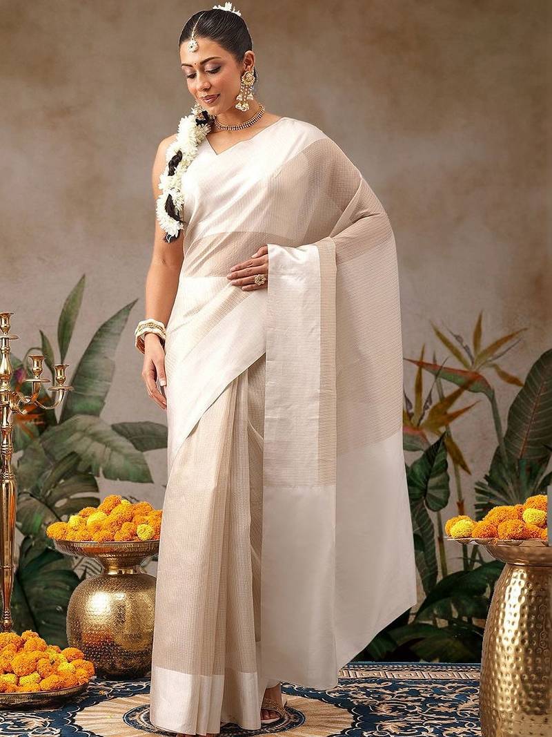 Off white woven silk blend ethnic saree with blouse piece