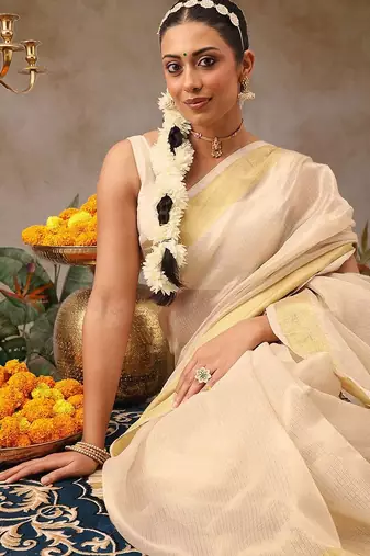 Off white woven silk blend ethnic saree with blouse piece