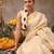 Off white woven silk blend ethnic saree with blouse piece