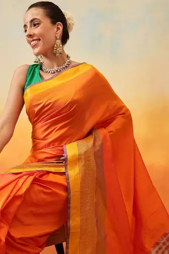 Orange plain art silk traditional saree with blouse piece
