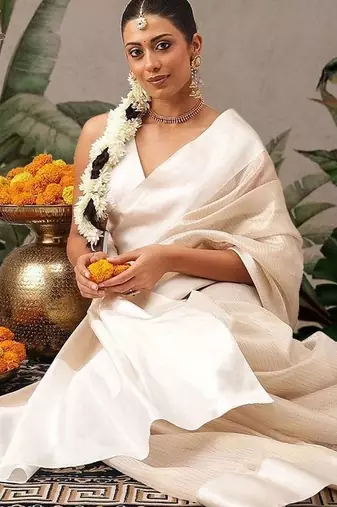 Off white woven silk blend ethnic saree with blouse piece