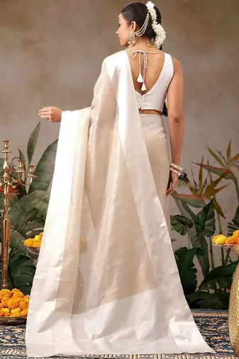 Off white woven silk blend ethnic saree with blouse piece