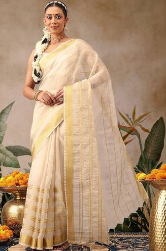 Off white woven silk blend ethnic saree with blouse piece