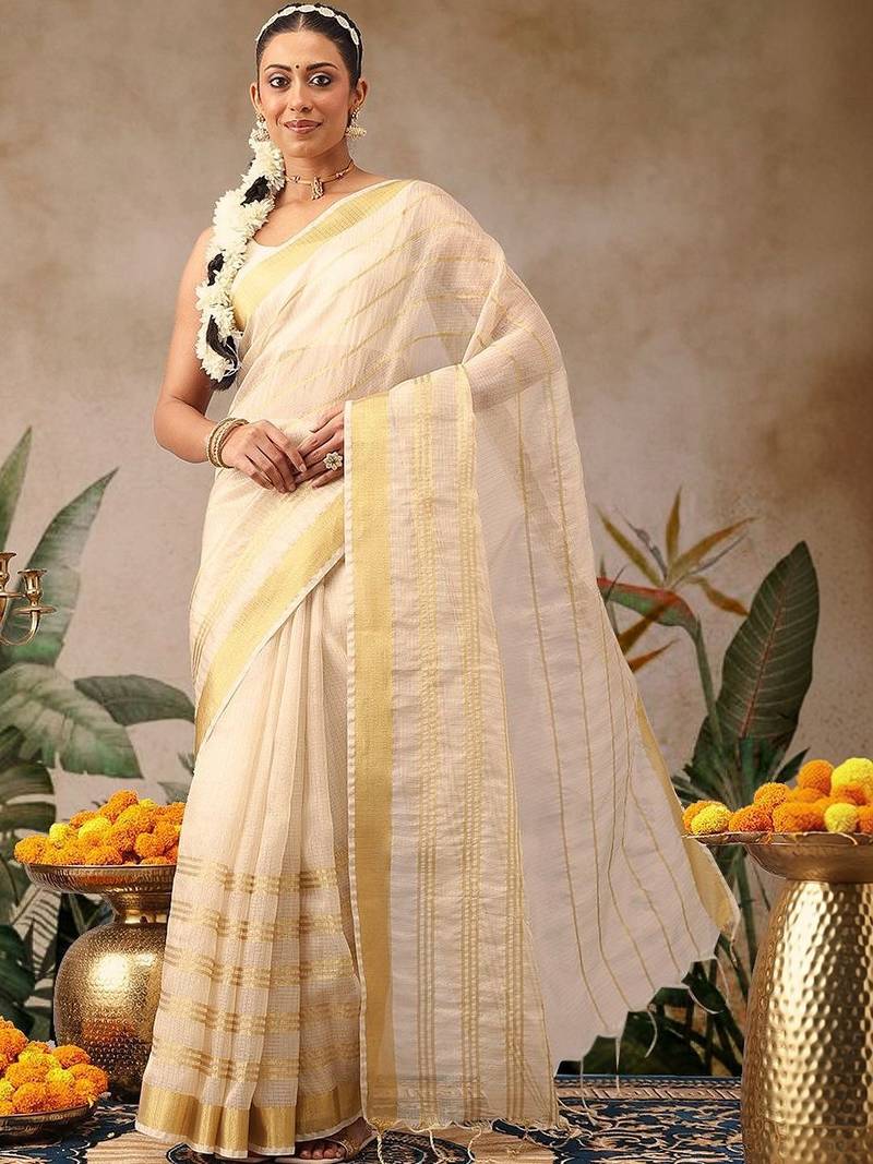 Off white woven silk blend ethnic saree with blouse piece